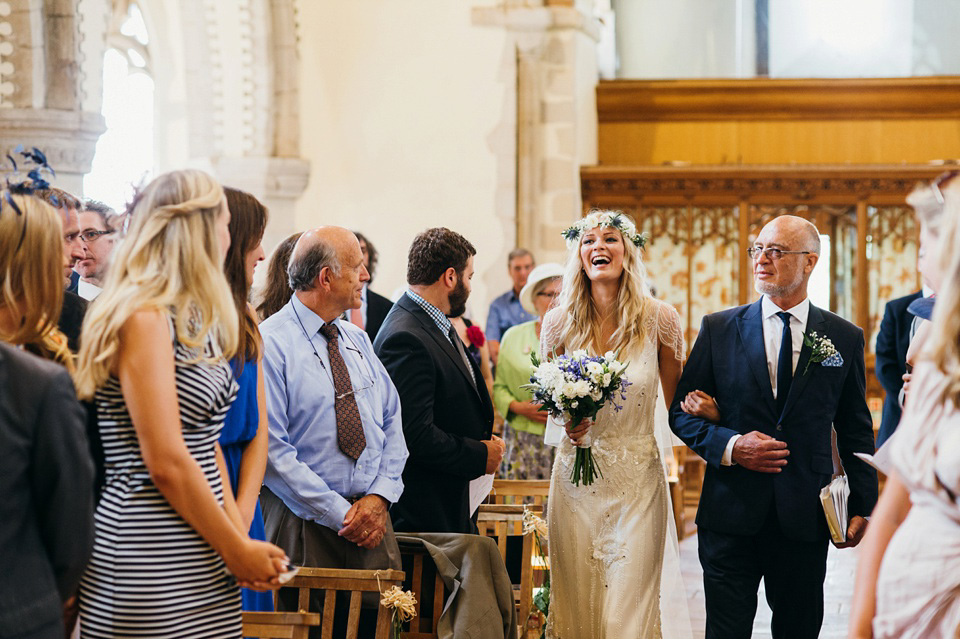 A pretty pale blue summer Barn wedding. The bride wears Jenny Packham and a floral crown. Image by Babb Photography