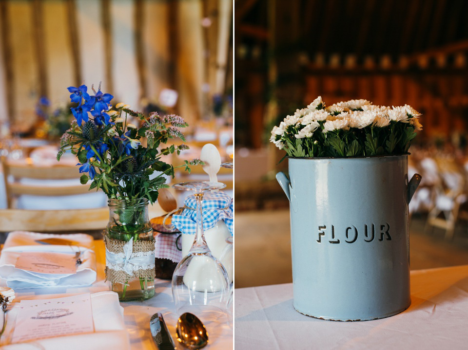 A pretty pale blue summer Barn wedding. The bride wears Jenny Packham and a floral crown. Image by Babb Photography