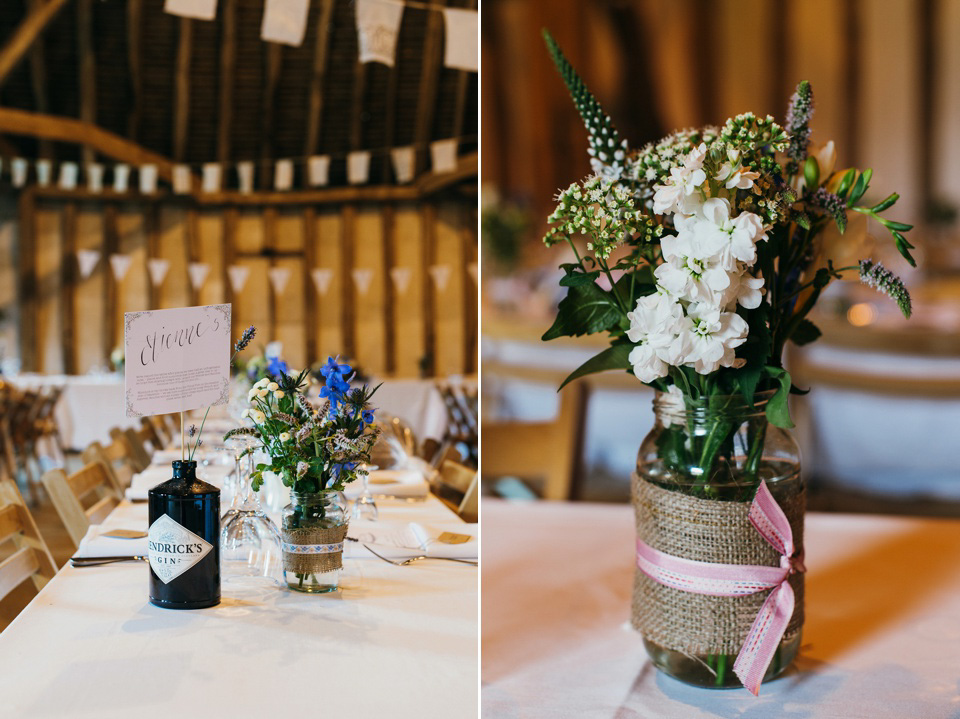 A pretty pale blue summer Barn wedding. The bride wears Jenny Packham and a floral crown. Image by Babb Photography