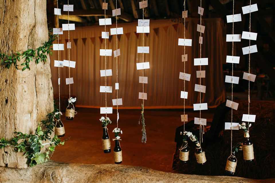 A pretty pale blue summer Barn wedding. The bride wears Jenny Packham and a floral crown. Image by Babb Photography