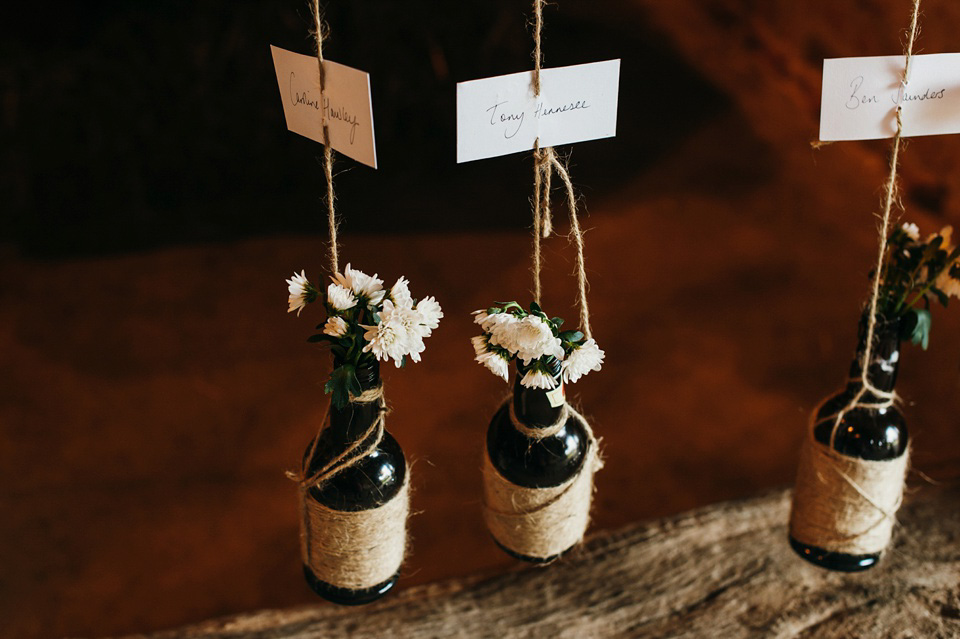 A pretty pale blue summer Barn wedding. The bride wears Jenny Packham and a floral crown. Image by Babb Photography