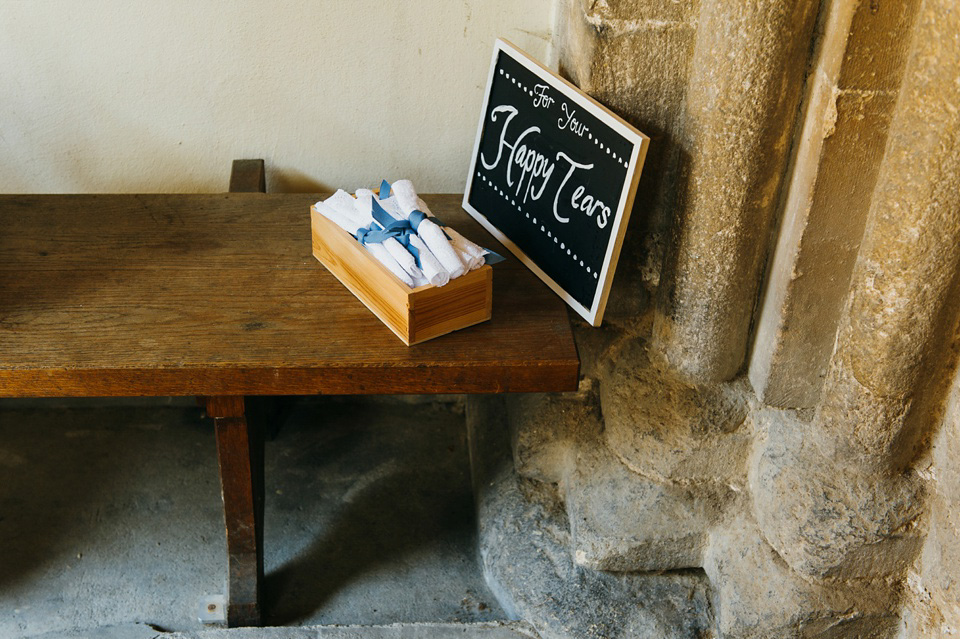 A pretty pale blue summer Barn wedding. The bride wears Jenny Packham and a floral crown. Image by Babb Photography