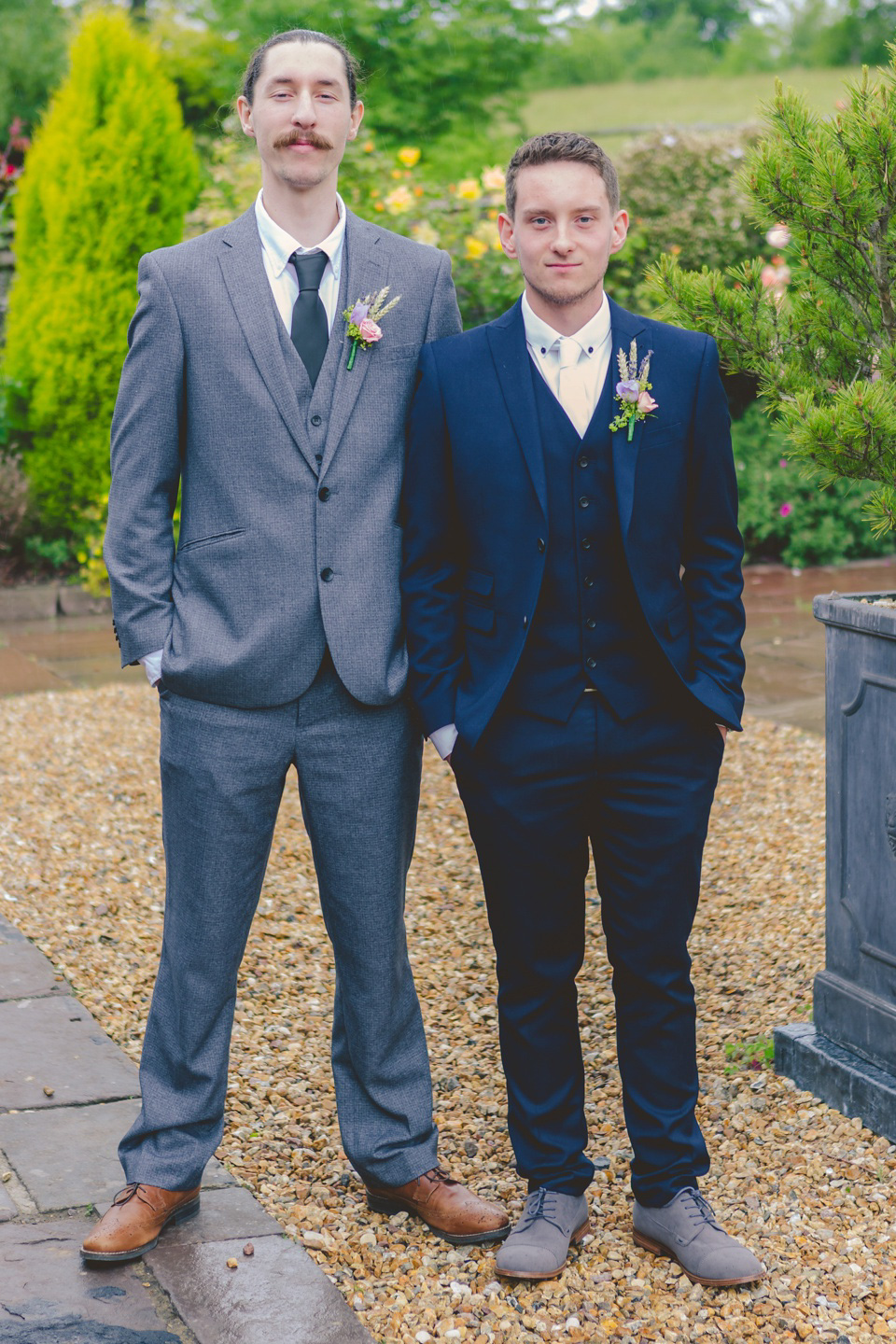 The bride wears a Jacques Vert dress from Debenhams for her Welsh country house wedding.