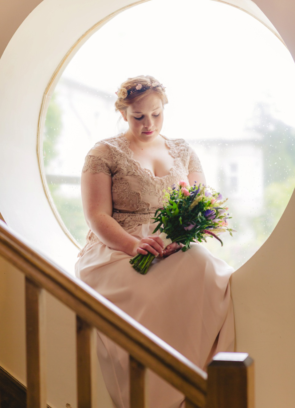The bride wears a Jacques Vert dress from Debenhams for her Welsh country house wedding.
