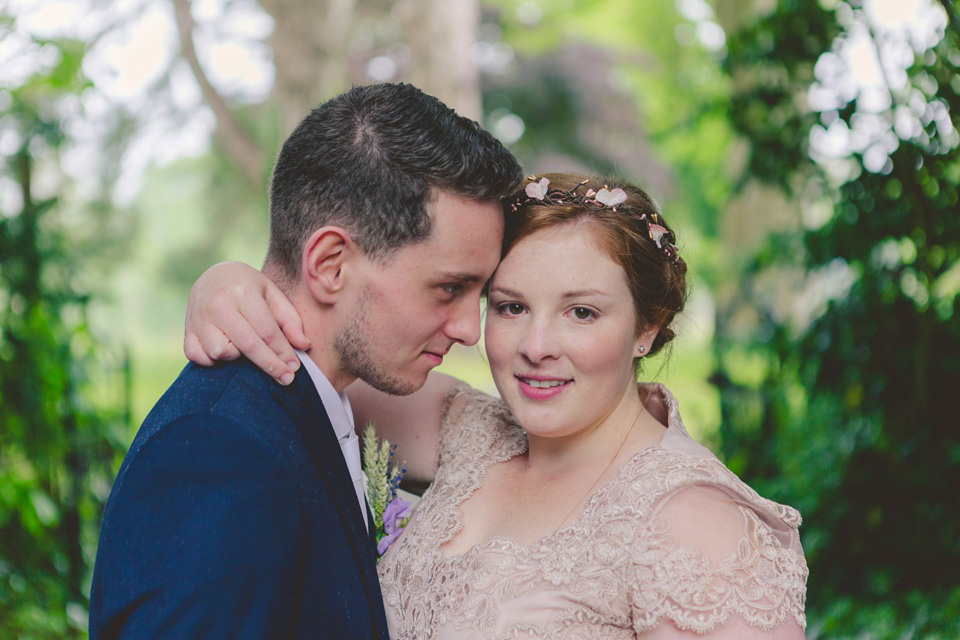 The bride wears a Jacques Vert dress from Debenhams for her Welsh country house wedding.