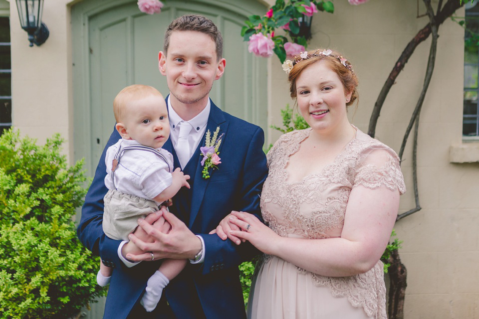 The bride wears a Jacques Vert dress from Debenhams for her Welsh country house wedding.