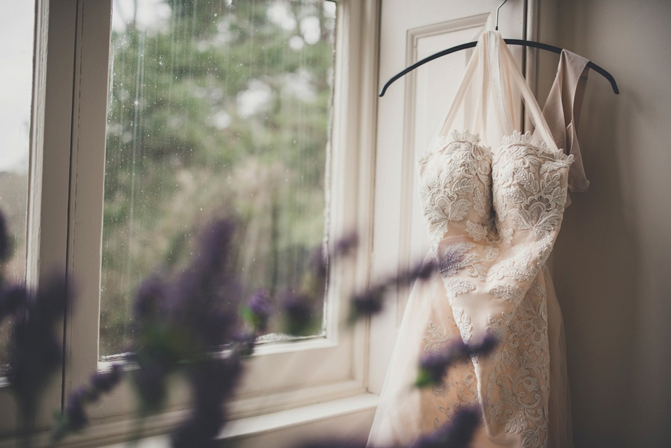 The bride made her own beautiful dress for her Spring time wedding in Cornwall. Photography by Amy Shore.