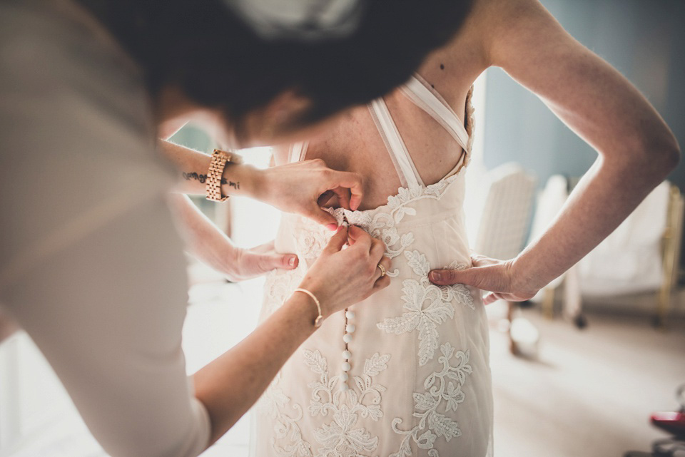 The bride made her own beautiful dress for her Spring time wedding in Cornwall. Photography by Amy Shore.