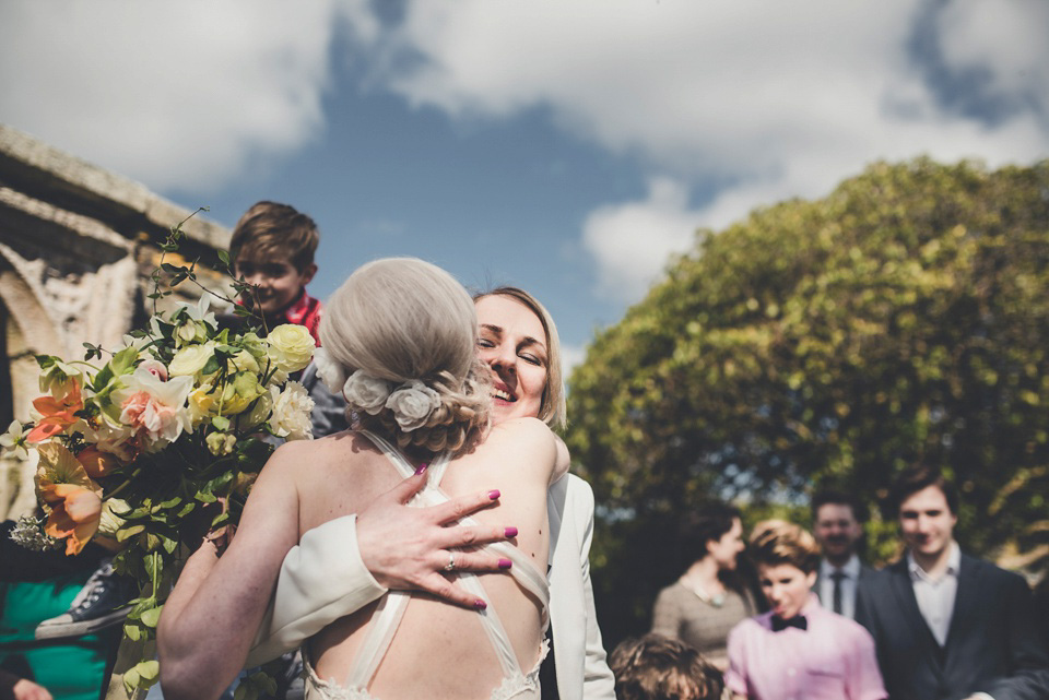 The bride made her own beautiful dress for her Spring time wedding in Cornwall. Photography by Amy Shore.
