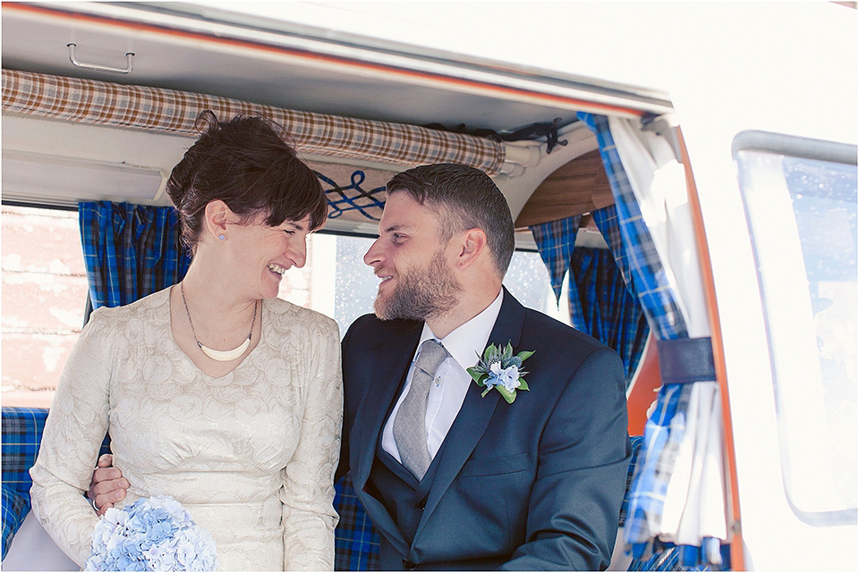 The bride wears a 1930s original vintage wedding gown for her village hall wedding in Scotland. Photography by Michelle Turnbull.