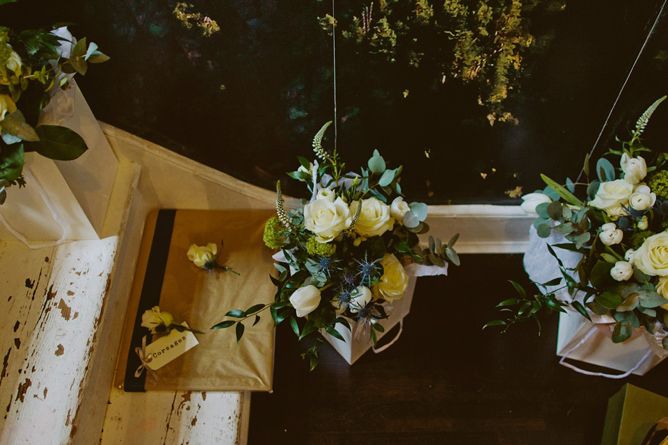 The bride wears Vivienne Westwood and Gold Rupert Sanderson shoes for her wedding at The Asylum in Peckham, London. Photography by David Jenkins.