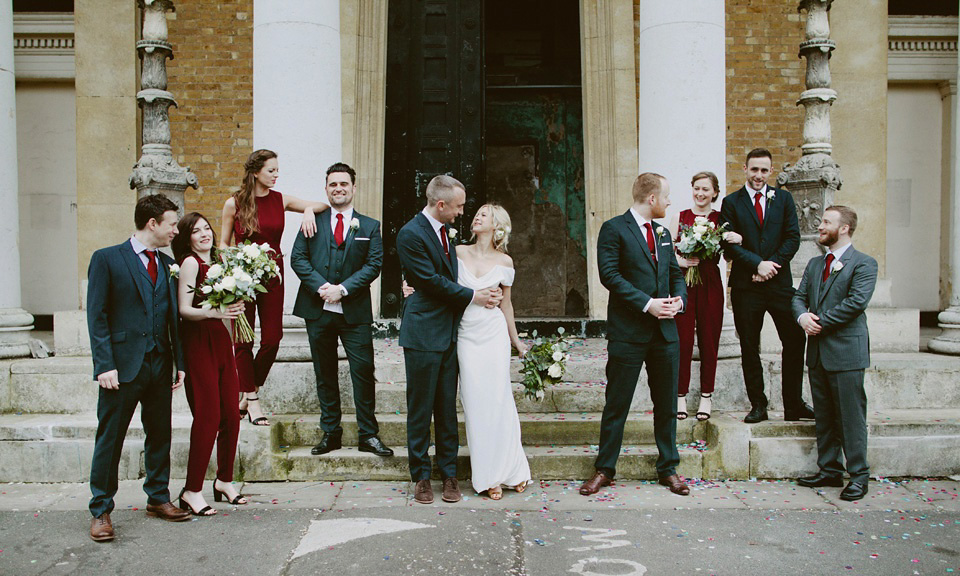 The bride wears Vivienne Westwood and Gold Rupert Sanderson shoes for her wedding at The Asylum in Peckham, London. Photography by David Jenkins.