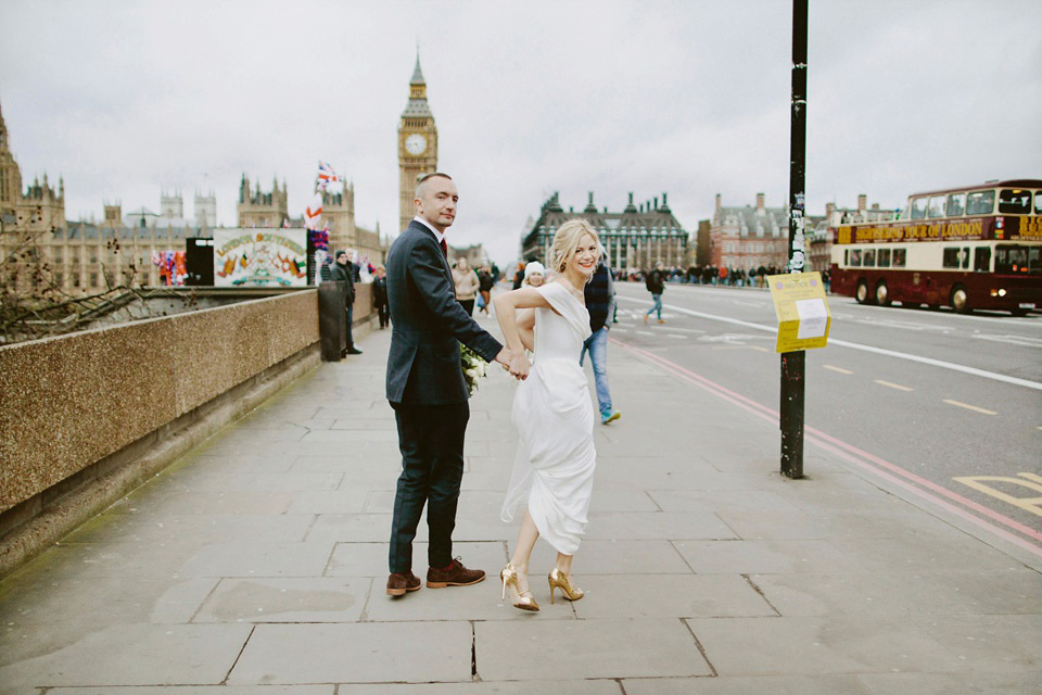 The bride wears Vivienne Westwood and Gold Rupert Sanderson shoes for her wedding at The Asylum in Peckham, London. Photography by David Jenkins.