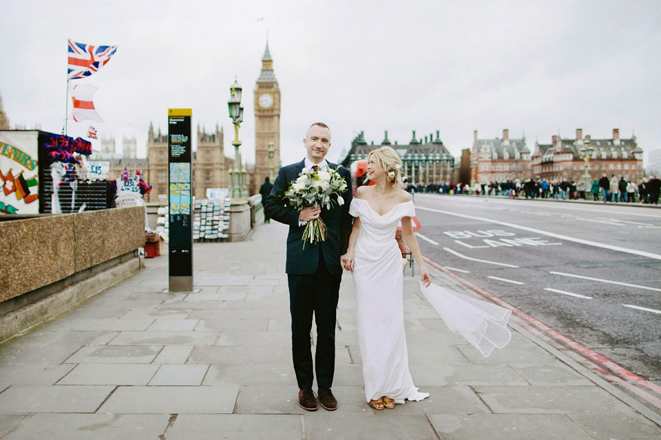 The bride wears Vivienne Westwood and Gold Rupert Sanderson shoes for her wedding at The Asylum in Peckham, London. Photography by David Jenkins.