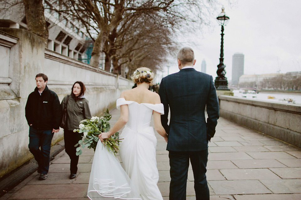 The bride wears Vivienne Westwood and Gold Rupert Sanderson shoes for her wedding at The Asylum in Peckham, London. Photography by David Jenkins.