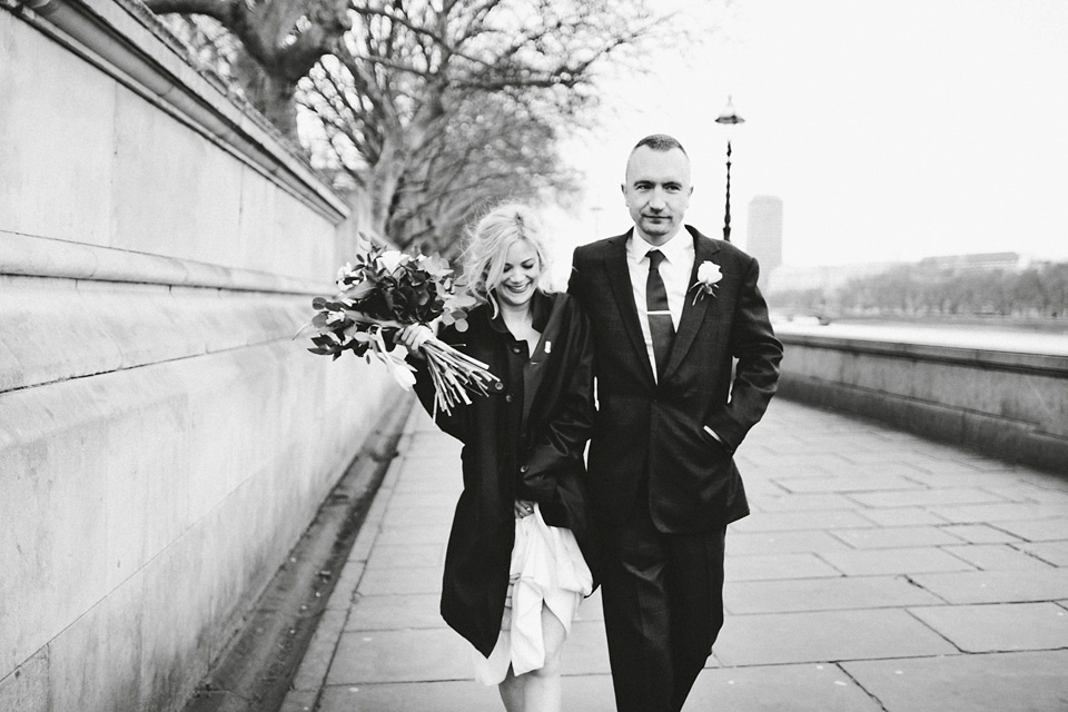 The bride wears Vivienne Westwood and Gold Rupert Sanderson shoes for her wedding at The Asylum in Peckham, London. Photography by David Jenkins.