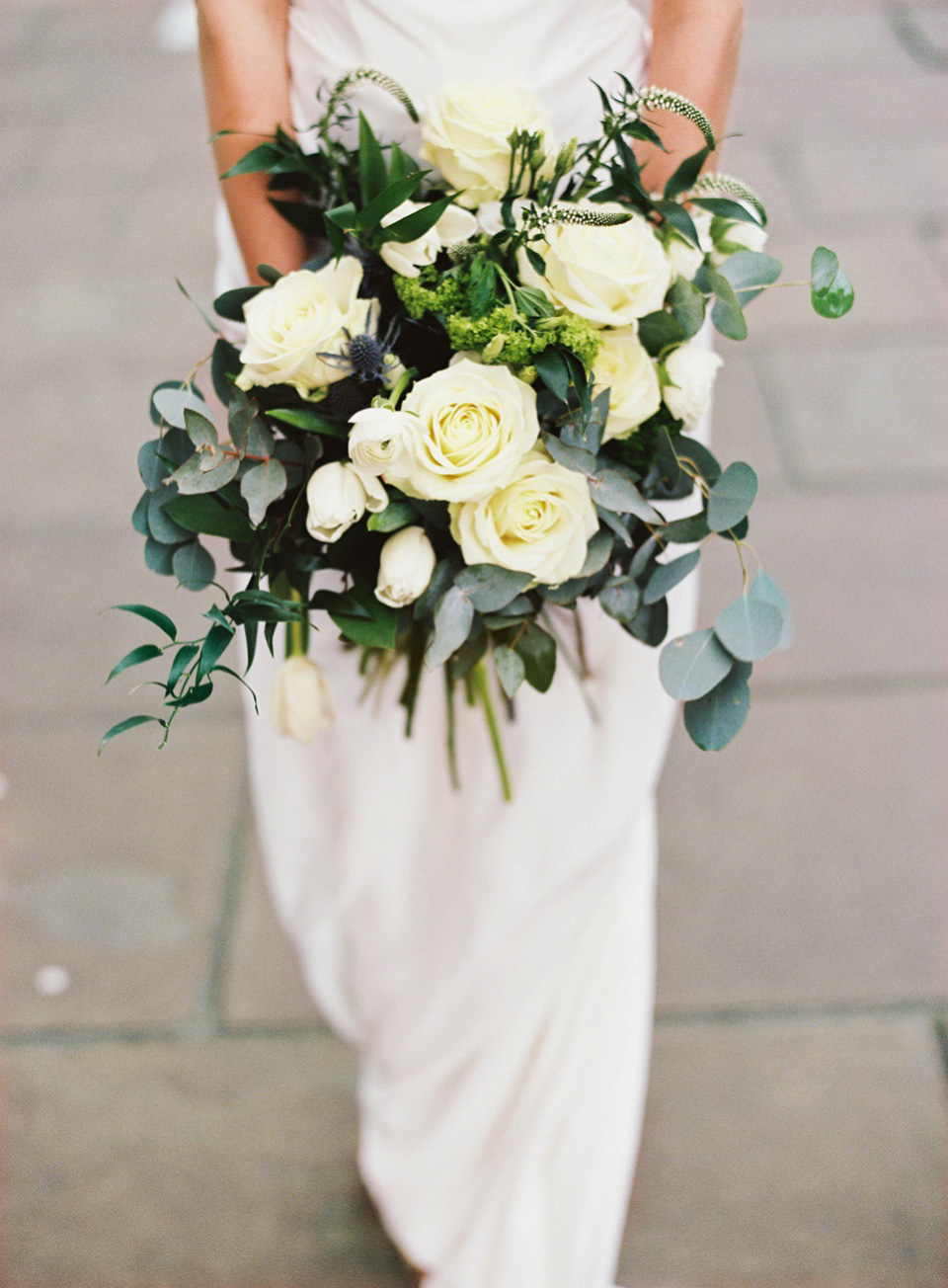 The bride wears Vivienne Westwood and Gold Rupert Sanderson shoes for her wedding at The Asylum in Peckham, London. Photography by David Jenkins.