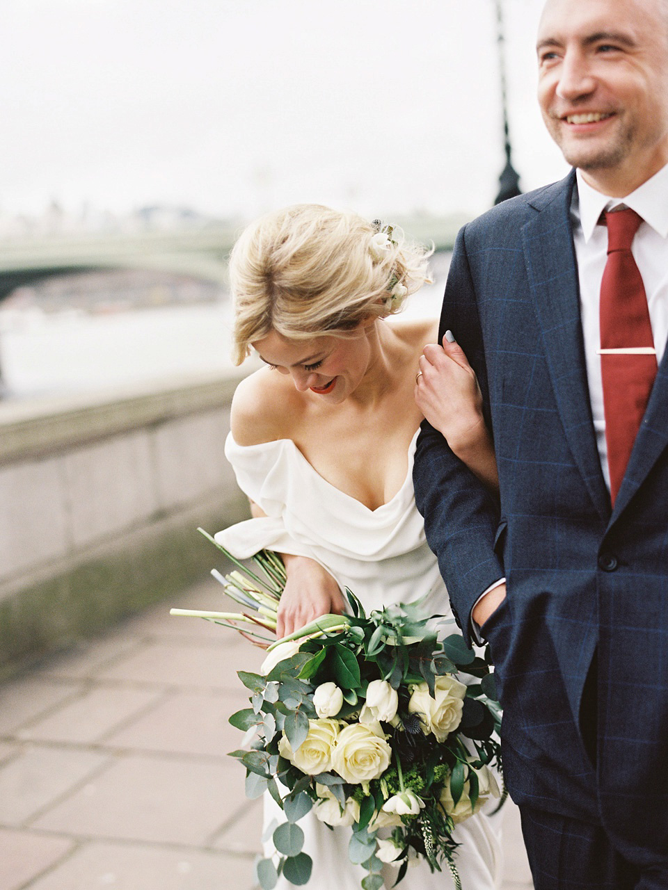 The bride wears Vivienne Westwood and Gold Rupert Sanderson shoes for her wedding at The Asylum in Peckham, London. Photography by David Jenkins.