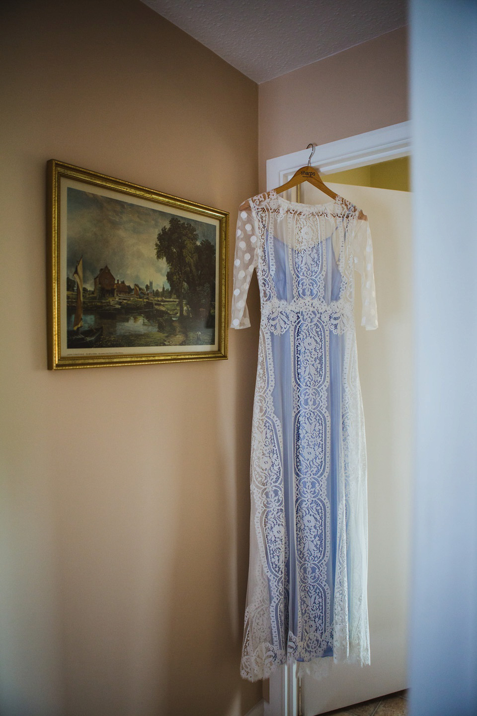 The bride wears a pale blue dress by Katya Katya Shehurina for her Spring, rural style wedding at Great Street Barn. Photography by Amy B.