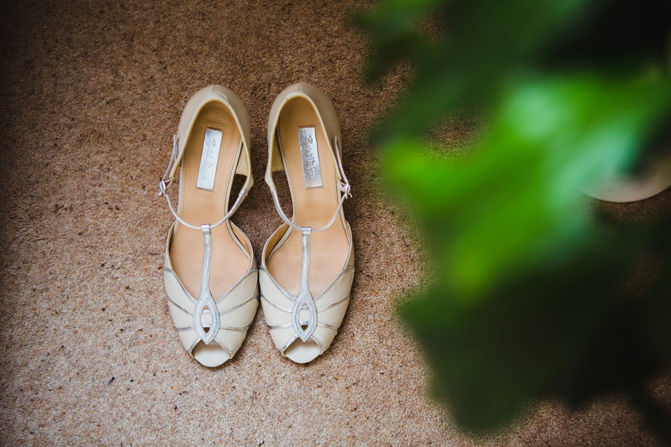 The bride wears a pale blue dress by Katya Katya Shehurina for her Spring, rural style wedding at Great Street Barn. Photography by Amy B.