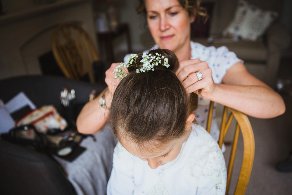 The bride wears a pale blue dress by Katya Katya Shehurina for her Spring, rural style wedding at Great Street Barn. Photography by Amy B.