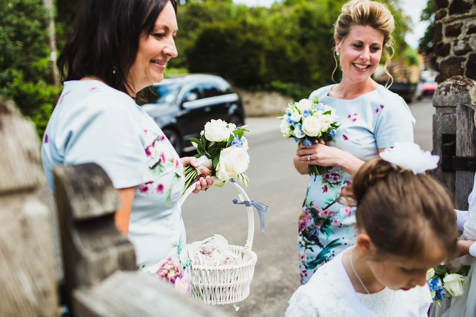 The bride wears a pale blue dress by Katya Katya Shehurina for her Spring, rural style wedding at Great Street Barn. Photography by Amy B.