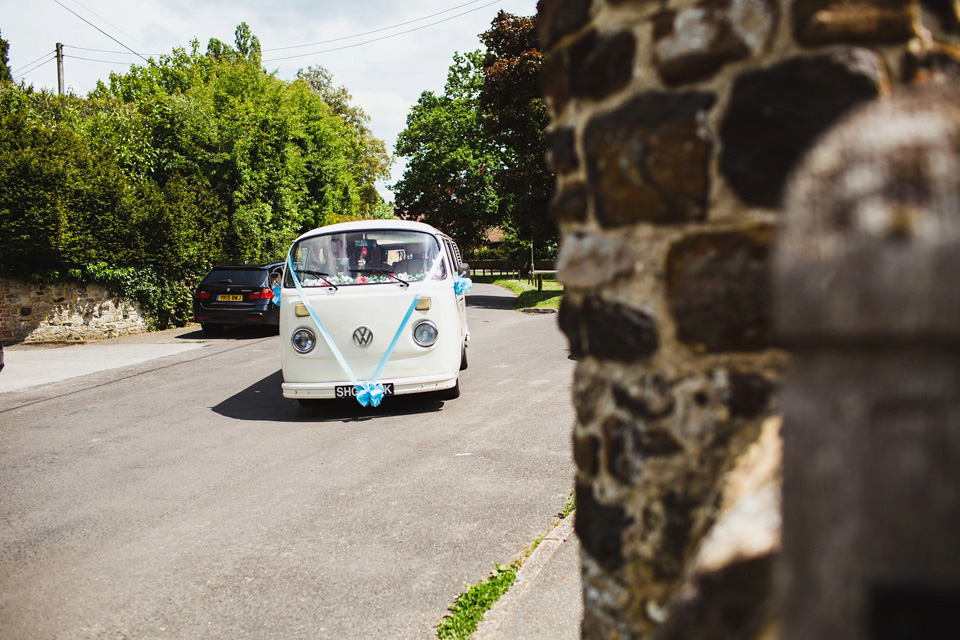 The bride wears a pale blue dress by Katya Katya Shehurina for her Spring, rural style wedding at Great Street Barn. Photography by Amy B.