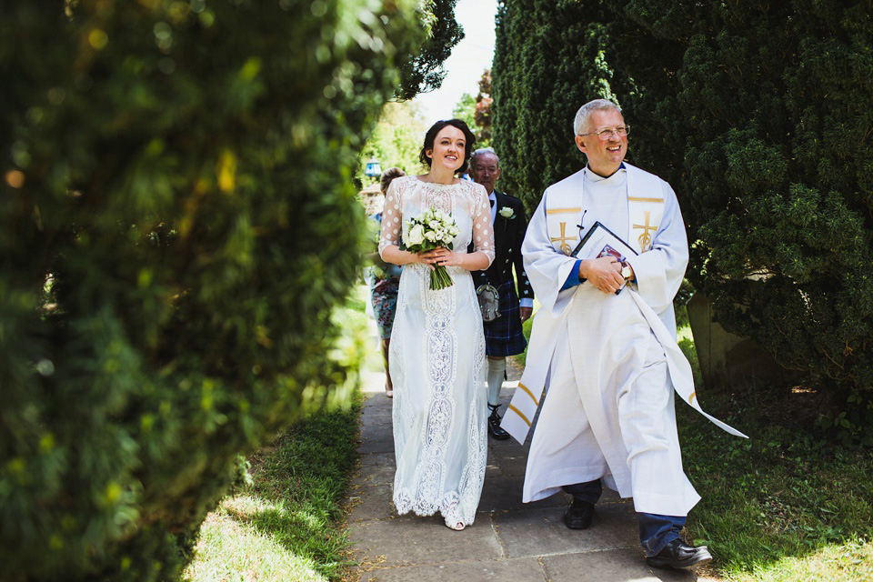 The bride wears a pale blue dress by Katya Katya Shehurina for her Spring, rural style wedding at Great Street Barn. Photography by Amy B.