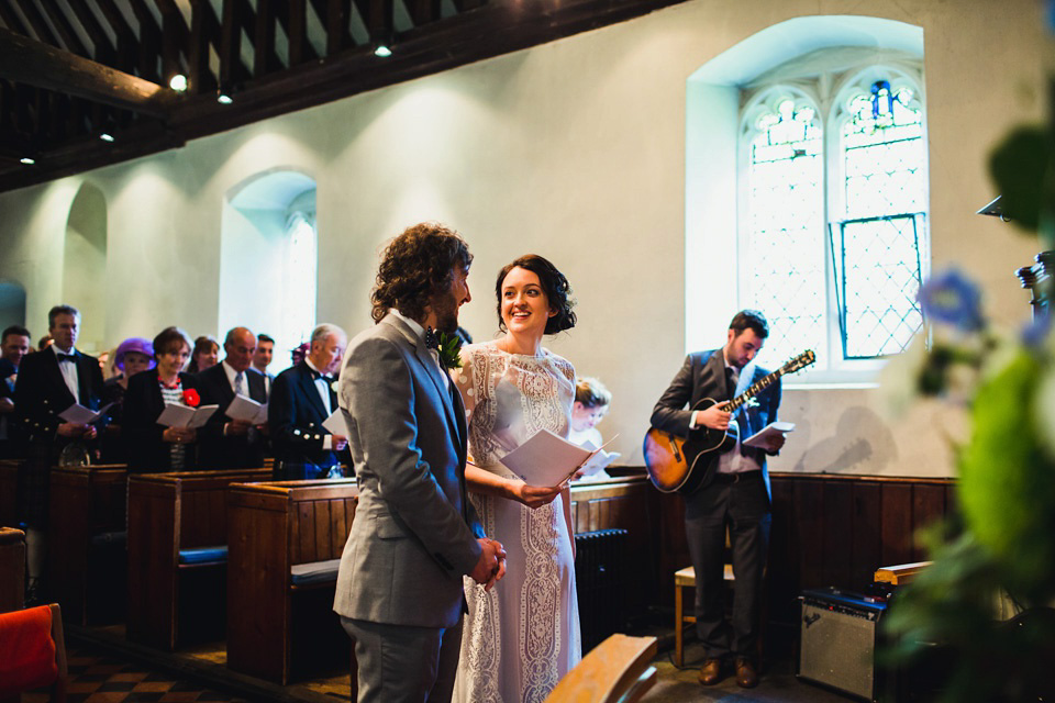 The bride wears a pale blue dress by Katya Katya Shehurina for her Spring, rural style wedding at Great Street Barn. Photography by Amy B.