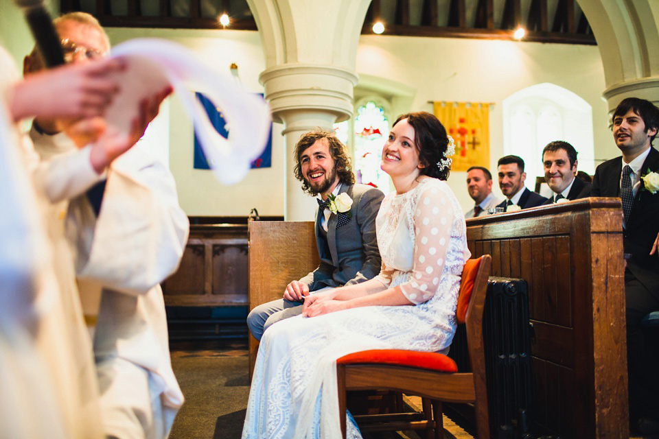 The bride wears a pale blue dress by Katya Katya Shehurina for her Spring, rural style wedding at Great Street Barn. Photography by Amy B.