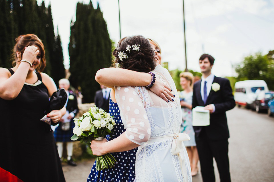 The bride wears a pale blue dress by Katya Katya Shehurina for her Spring, rural style wedding at Great Street Barn. Photography by Amy B.