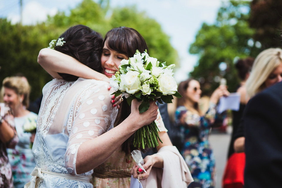 The bride wears a pale blue dress by Katya Katya Shehurina for her Spring, rural style wedding at Great Street Barn. Photography by Amy B.