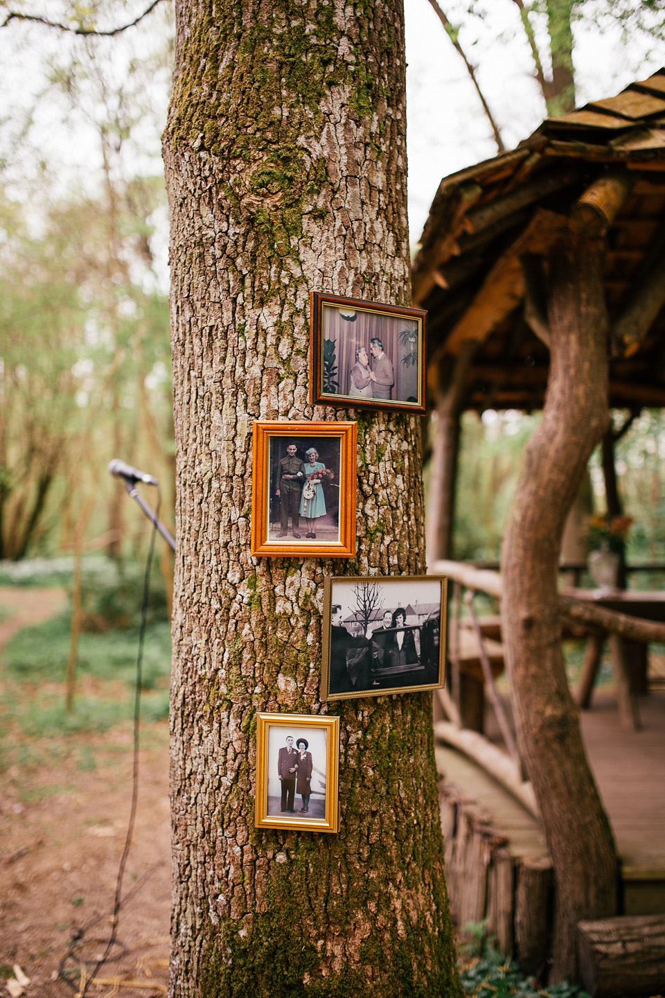 The bride wears a Sabina Motasem gown for her rustic, festival style wedding with glamping near the forrest. Photography by Joanna Nicole.