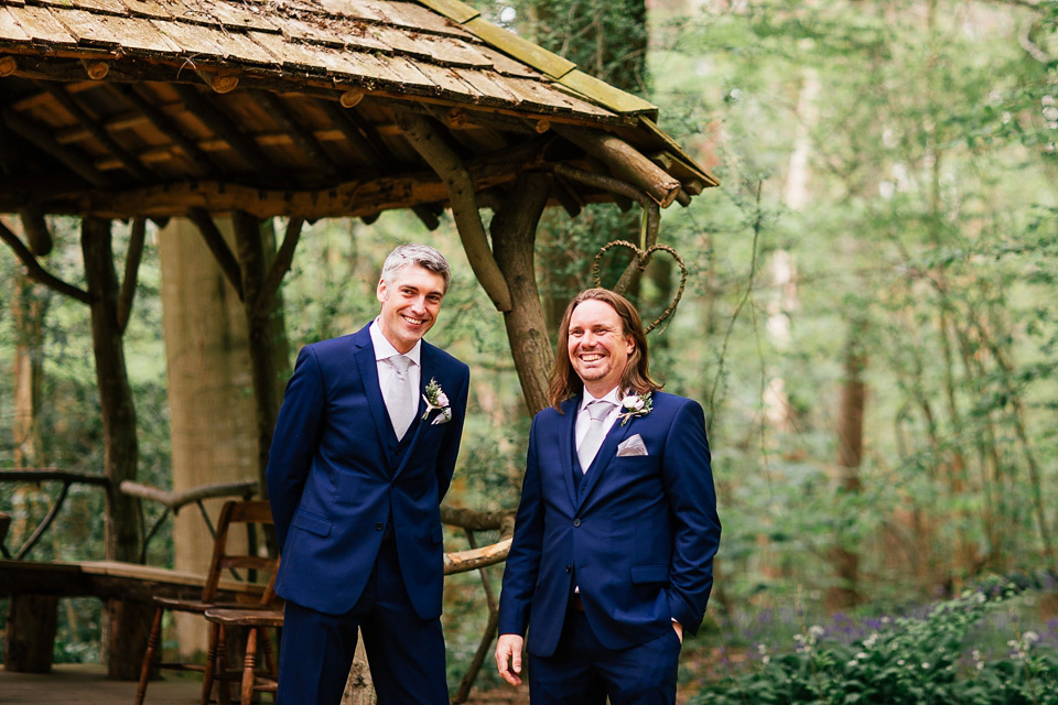 The bride wears a Sabina Motasem gown for her rustic, festival style wedding with glamping near the forrest. Photography by Joanna Nicole.