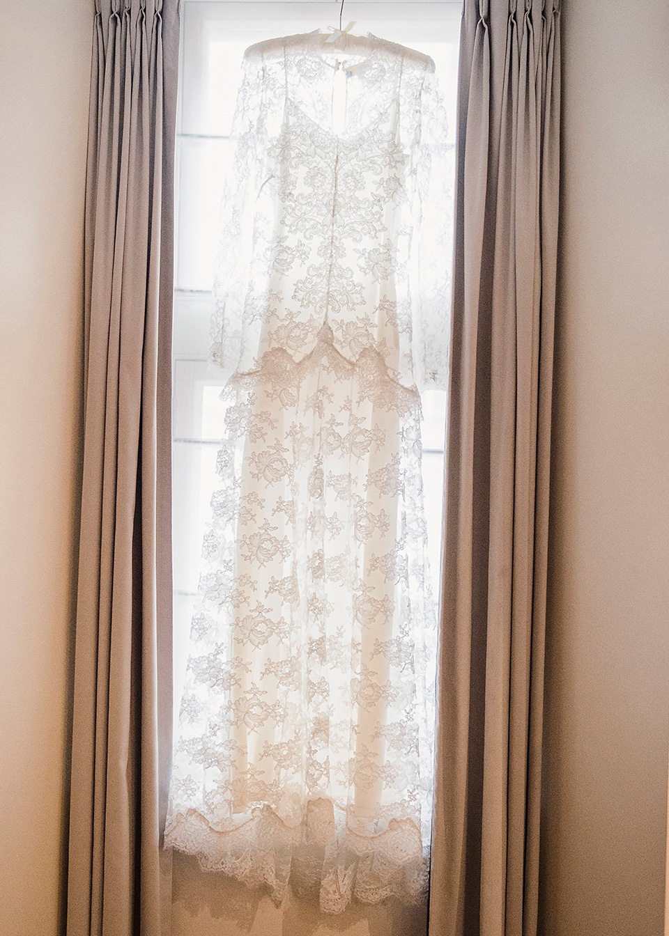 The bride wears Temperley London for her Wiltons Music Hall wedding in London. Photography by Razia Jukes.