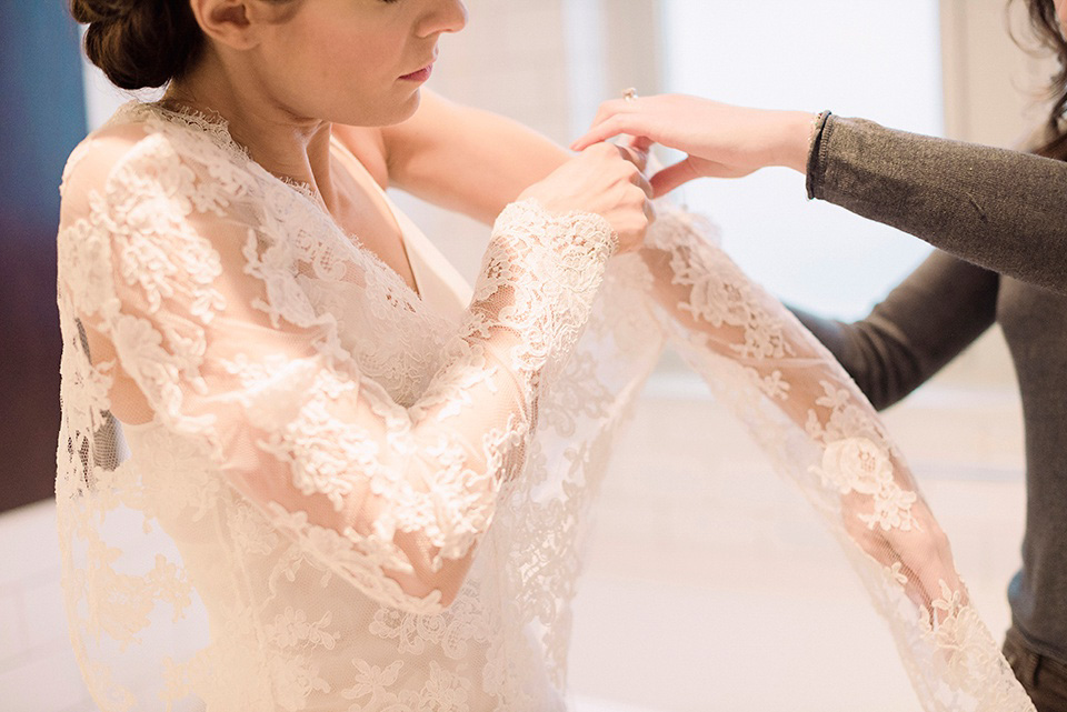 The bride wears Temperley London for her Wiltons Music Hall wedding in London. Photography by Razia Jukes.