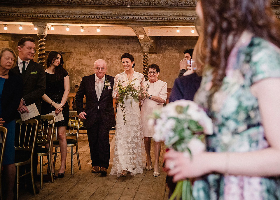 The bride wears Temperley London for her Wiltons Music Hall wedding in London. Photography by Razia Jukes.