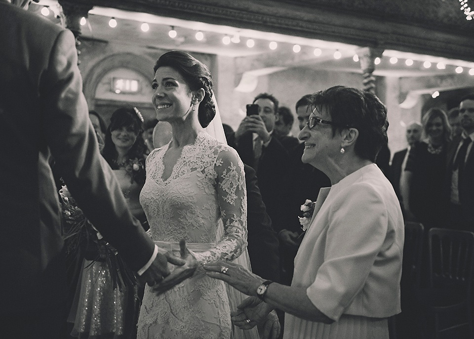 The bride wears Temperley London for her Wiltons Music Hall wedding in London. Photography by Razia Jukes.