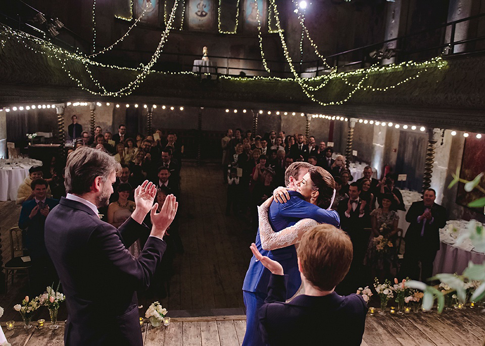 The bride wears Temperley London for her Wiltons Music Hall wedding in London. Photography by Razia Jukes.