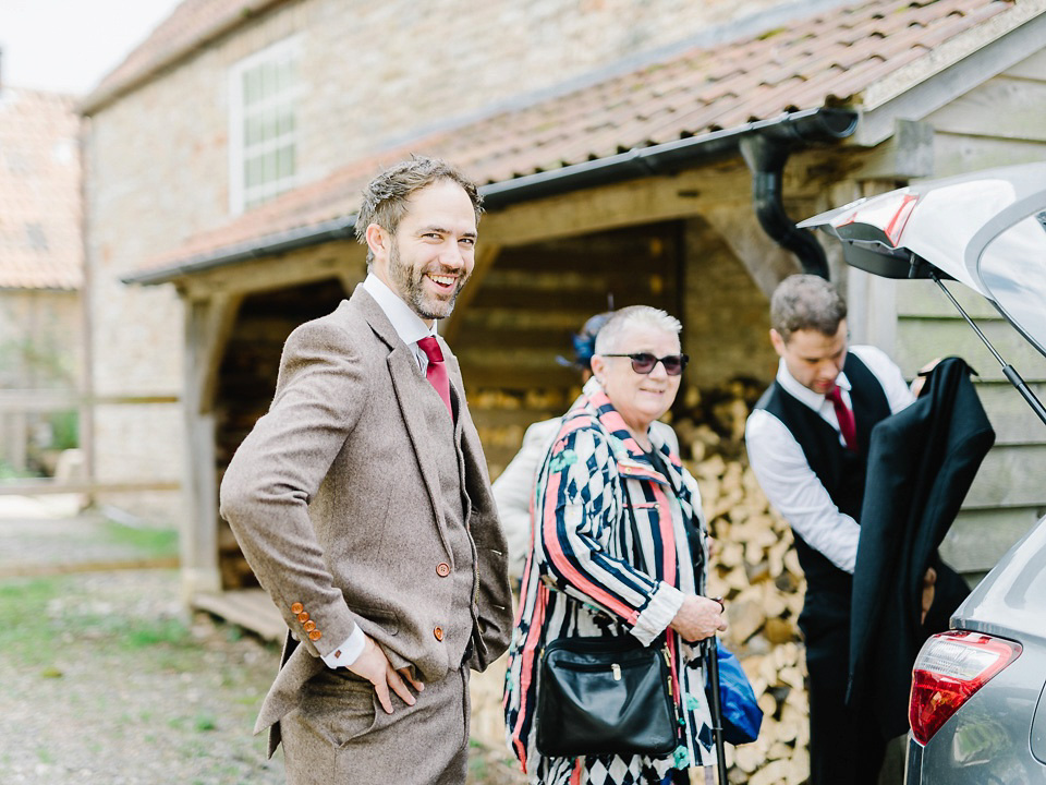 Bride Thea wears a Halfpenny London gown for her laid back dinner party wedding. Photography by John Barwood.