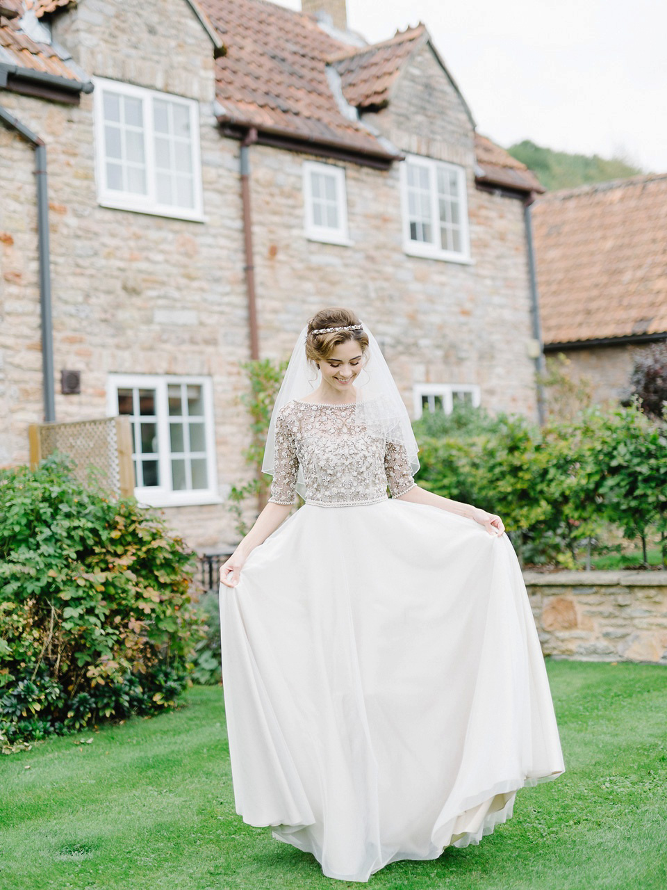 Bride Thea wears a Halfpenny London gown for her laid back dinner party wedding. Photography by John Barwood.