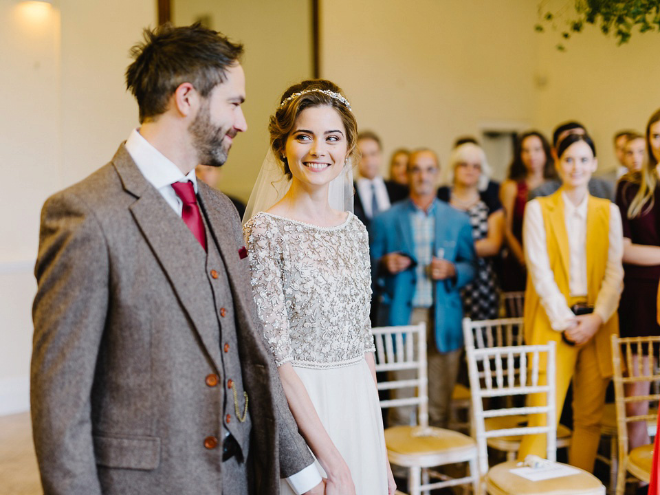 Bride Thea wears a Halfpenny London gown for her laid back dinner party wedding. Photography by John Barwood.