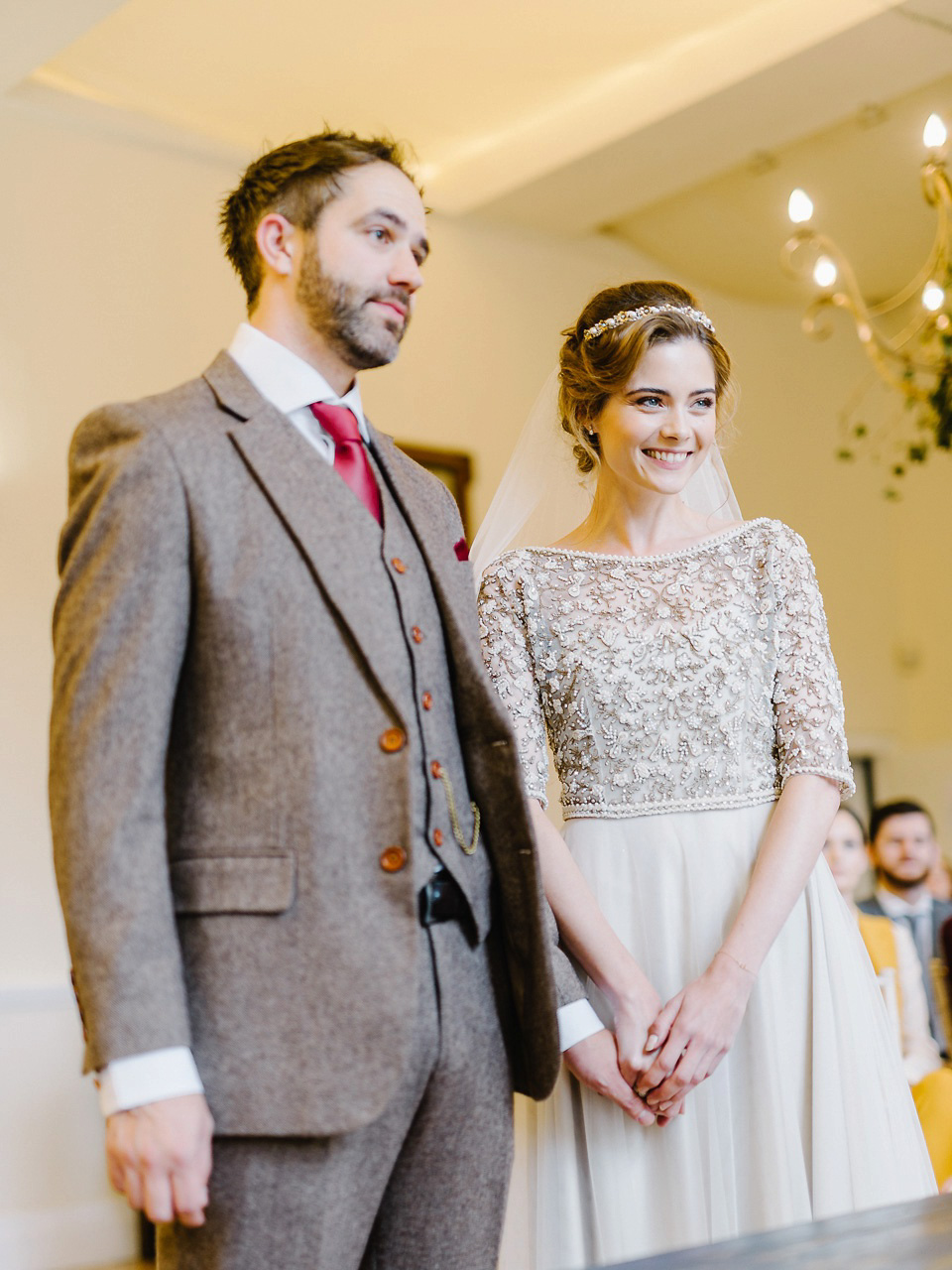 Bride Thea wears a Halfpenny London gown for her laid back dinner party wedding. Photography by John Barwood.