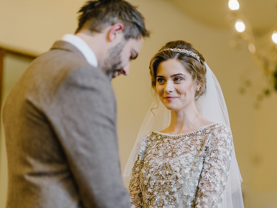 Bride Thea wears a Halfpenny London gown for her laid back dinner party wedding. Photography by John Barwood.