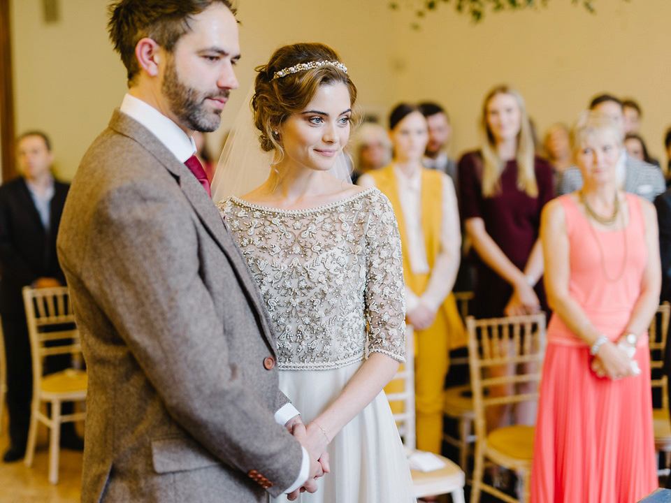 Bride Thea wears a Halfpenny London gown for her laid back dinner party wedding. Photography by John Barwood.