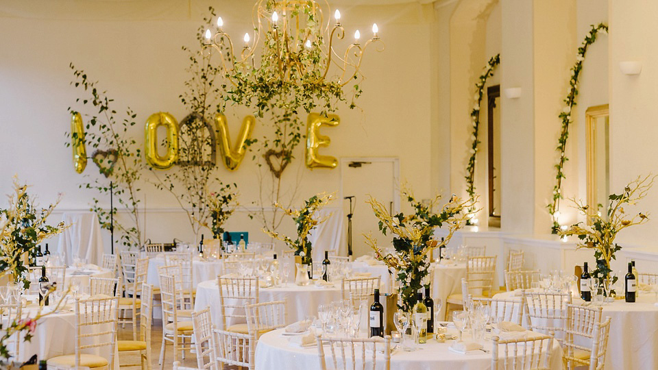 Bride Thea wears a Halfpenny London gown for her laid back dinner party wedding. Photography by John Barwood.