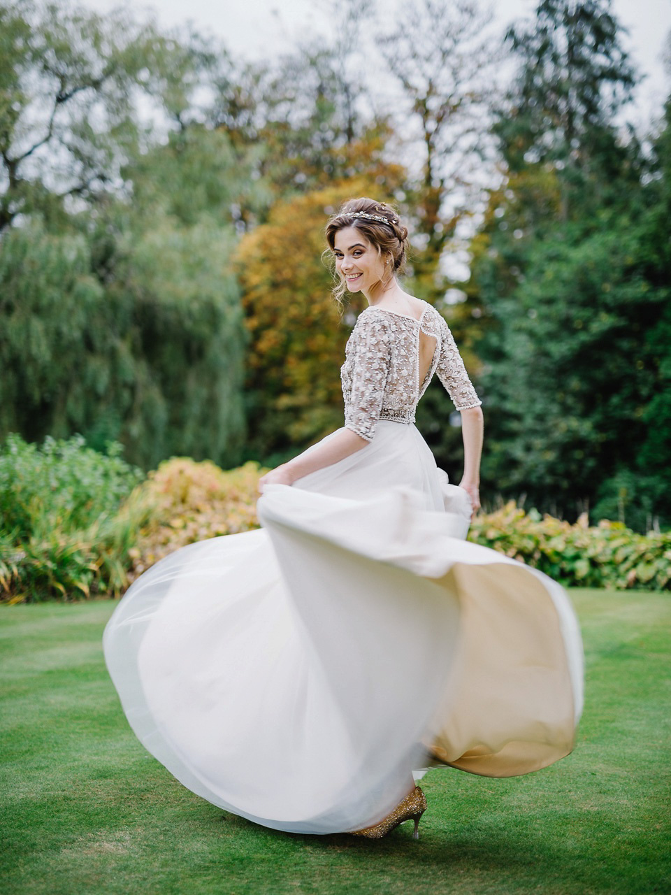 Bride Thea wears a Halfpenny London gown for her laid back dinner party wedding. Photography by John Barwood.