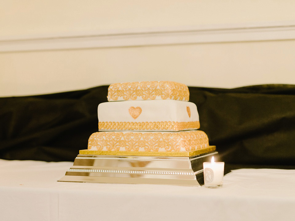 Bride Thea wears a Halfpenny London gown for her laid back dinner party wedding. Photography by John Barwood.