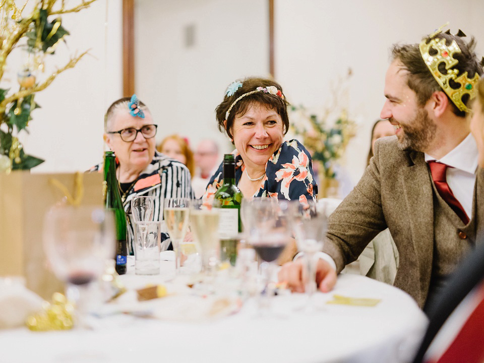 Bride Thea wears a Halfpenny London gown for her laid back dinner party wedding. Photography by John Barwood.