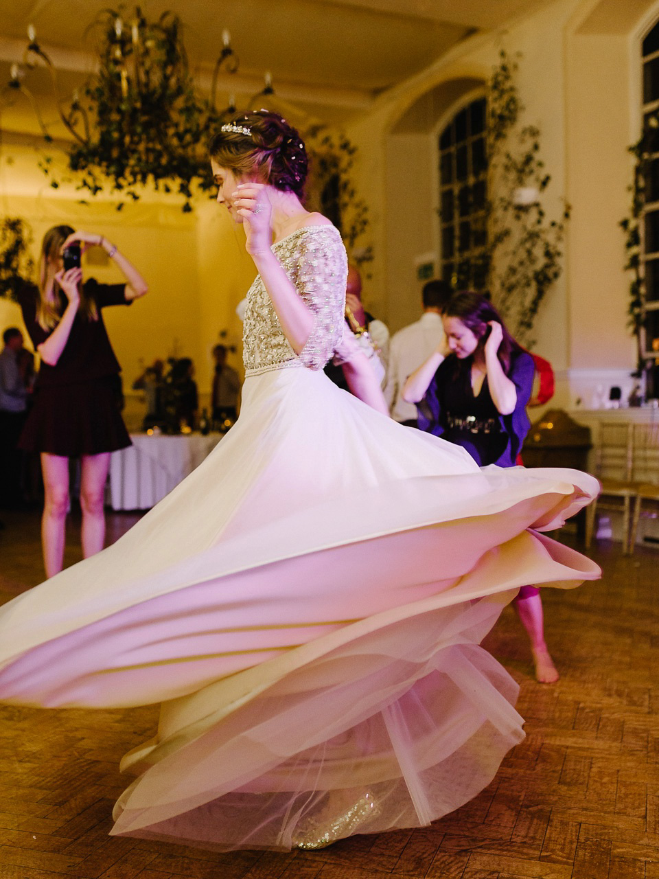 Bride Thea wears a Halfpenny London gown for her laid back dinner party wedding. Photography by John Barwood.